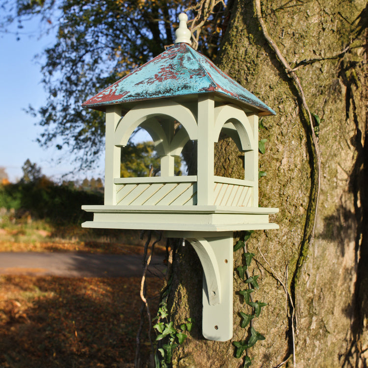 large wooden bird table